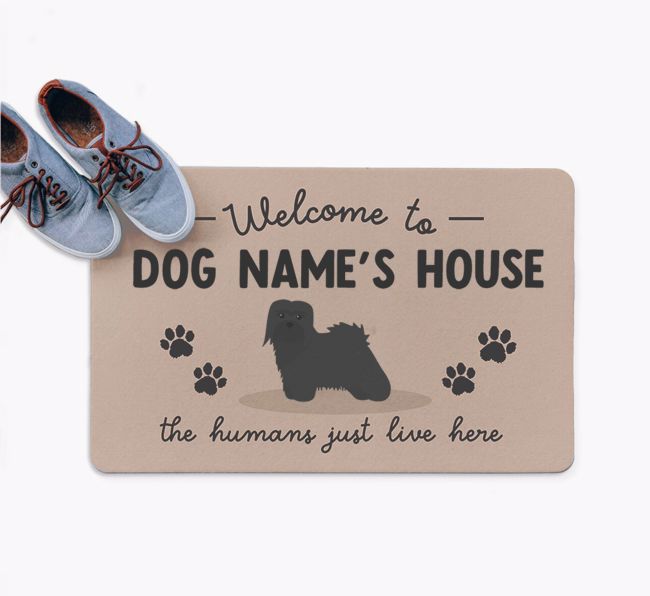 The Humans Just Live Here: Personalized {breedFullName} Doormat